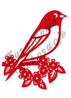 Ptak na gałęzi czerwony